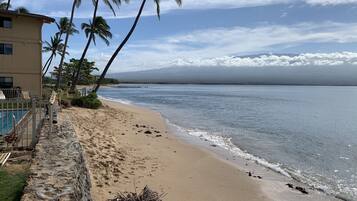 On the beach, sun loungers, beach towels