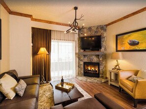 Televisión, chimenea y reproductor de DVD 