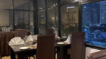 Breakfast, lunch, dinner served; local and international cuisine