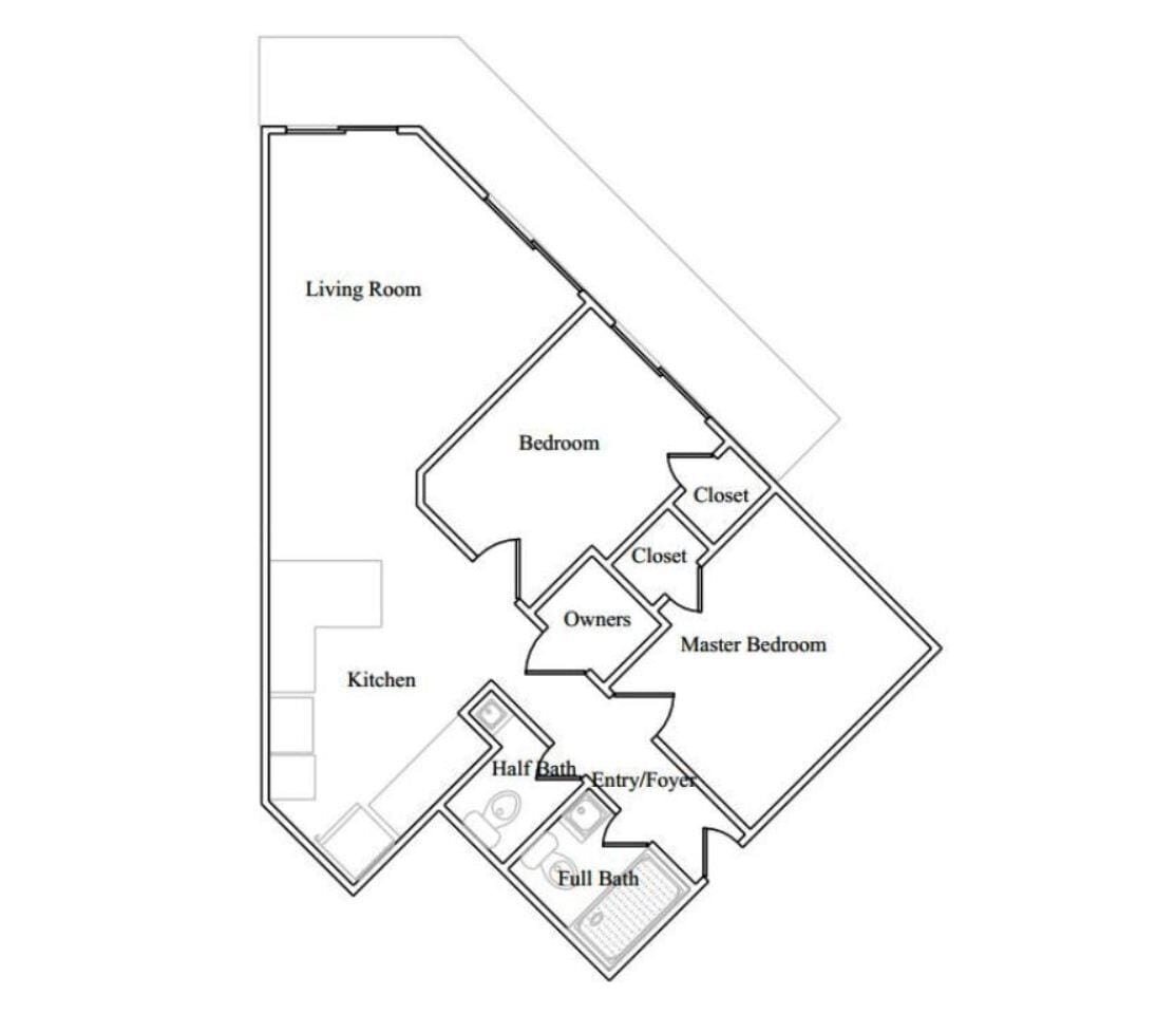 A floor plan with a living room, bedroom, kitchen, and bathroom areas.