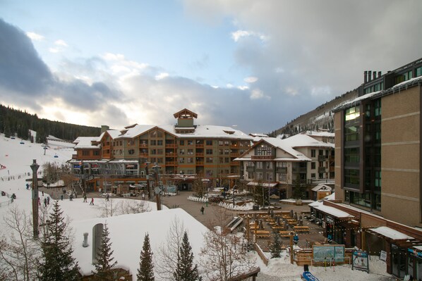 A large lodge with multiple floors and a ski lift in the background. - Updated Ski in/out Penthouse (Frisco)