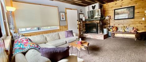 Smart TV, fireplace, foosball, books