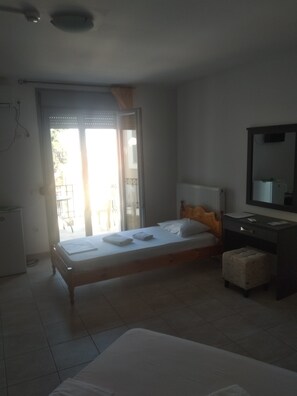 Deluxe Triple Room, Sea View (No3) | Minibar, in-room safe, desk, laptop workspace