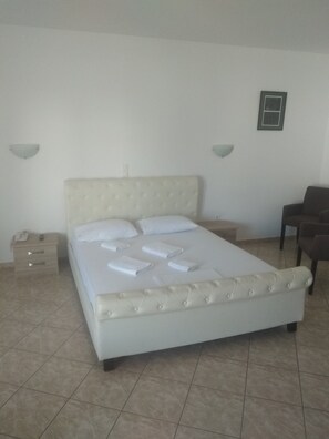Deluxe Triple Room, Sea View (No3) | Minibar, in-room safe, desk, laptop workspace