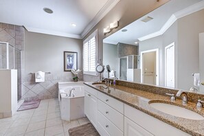 Combined shower/tub, hair dryer, towels, shampoo