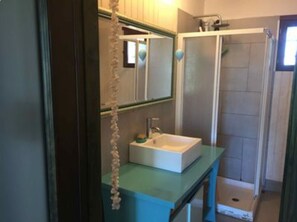 Shower, hair dryer, bidet, toilet paper