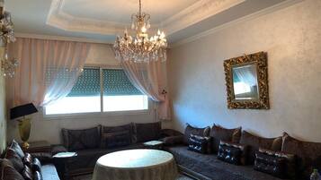 Apartment, 3 Bedrooms | Living area | Plasma TV