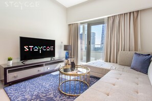 Apartemen Deluks, 1 kamar tidur | Area keluarga | TV LCD