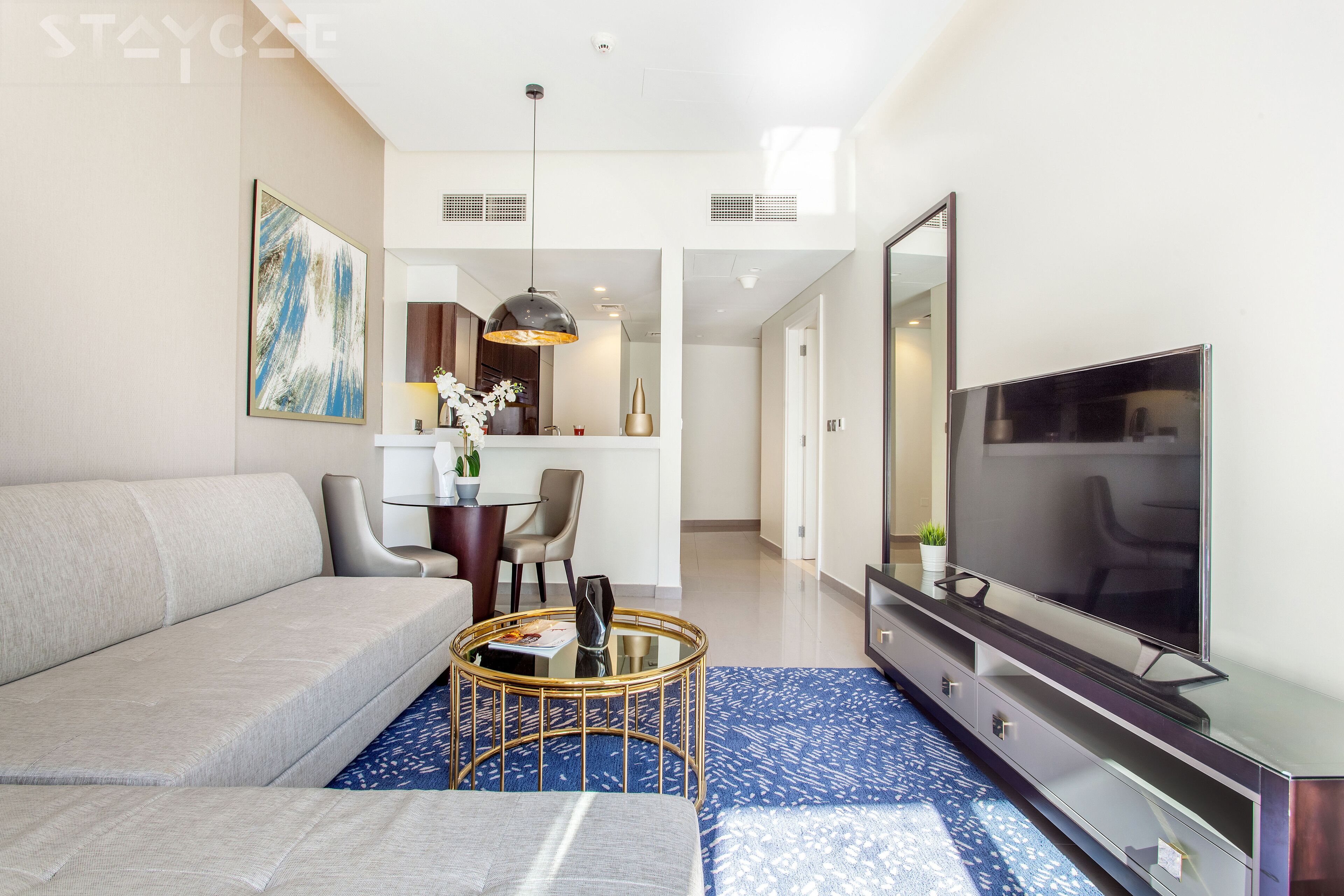 Appartement Deluxe, 1 chambre | Aire de séjour | Téléviseur ACL