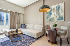 Deluxe Apartment, 1 Bedroom | Living area | LCD TV - Majestine Downtown (Dubai)