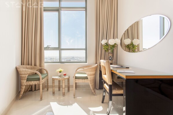 Deluxe Apartment, 1 Bedroom | Living room | LCD TV - Staycae Capital Bay (Dubai)