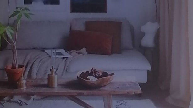A living room with a sofa, a coffee table, and a wall with framed pictures. - welcome our elegant, luxurious and unique properties where our visitor receive all services 24 hours. Our homes are located in a cool environment where your enjoy a beautiful serenity. Our homes jave easy access to social amenities, public service, eas... (Juja)