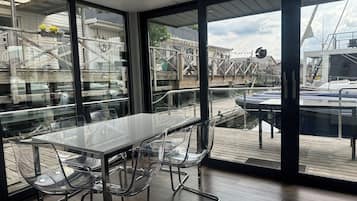 Houseboat with Lake view -Klädesholmen | Living area | Smart TV