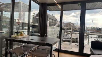 Houseboat with Lake view - Klippholmen | Living area | Smart TV