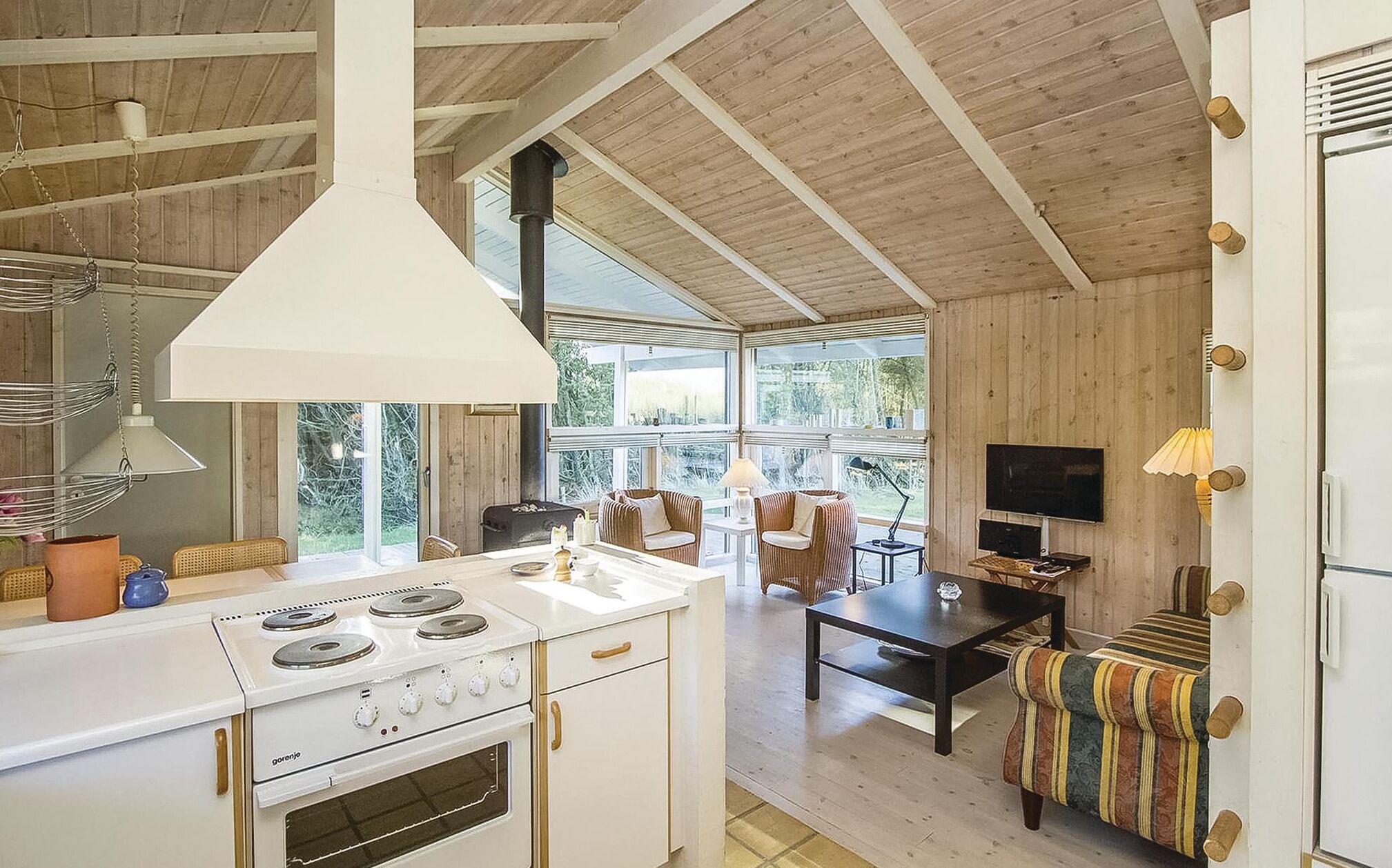 Fridge, stovetop, dishwasher, coffee/tea maker