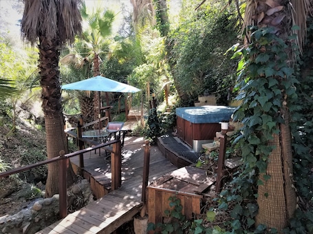 Outdoor spa tub. Private Resort "La Casita" Spa and Mini Golf Course