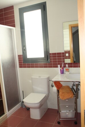 Bathtub, hair dryer, towels