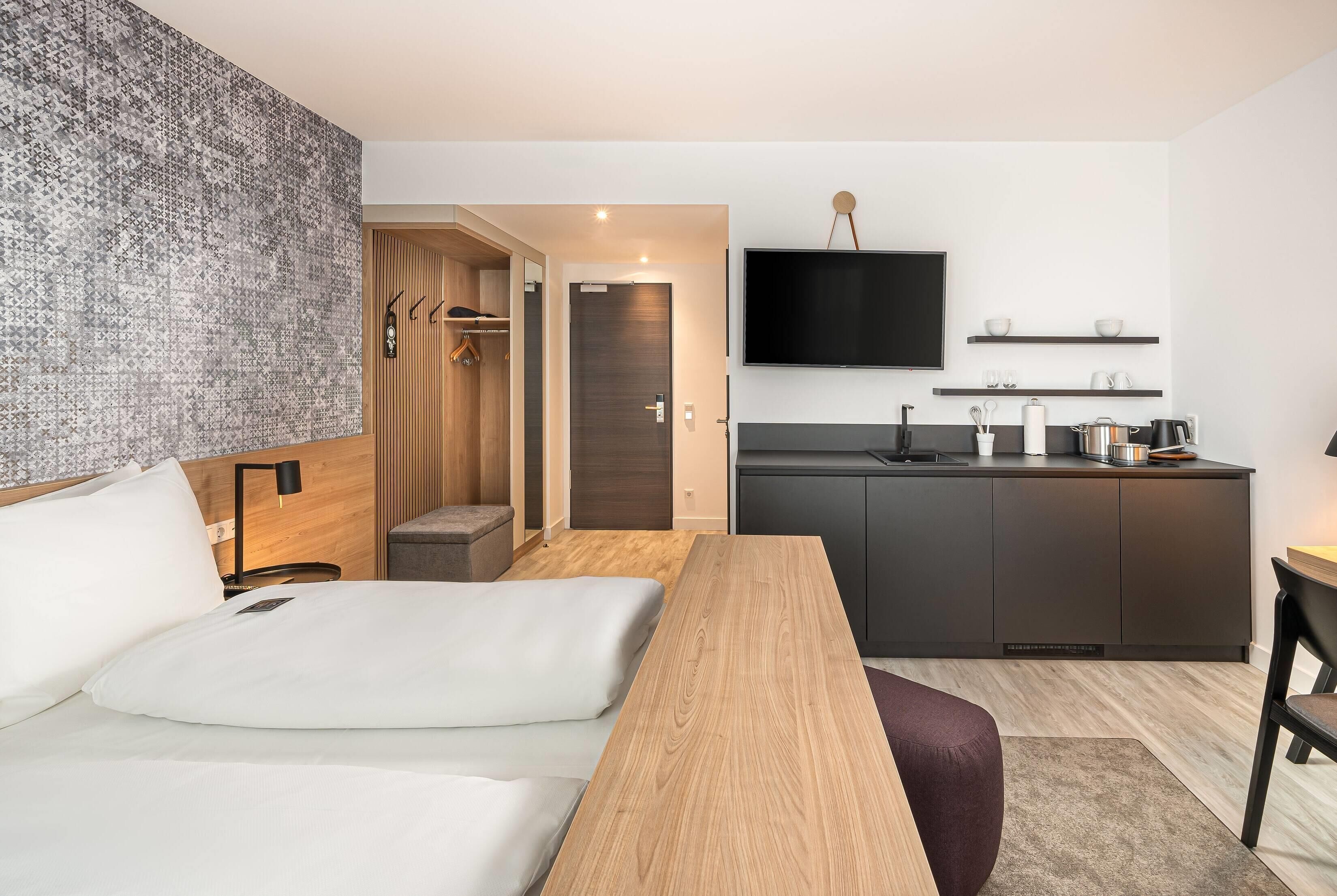 Apartment | Schreibtisch, laptopgeeigneter Arbeitsplatz, schallisolierte Zimmer