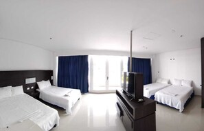 Elite Quadruple Room | Minibar, blackout drapes, free WiFi, bed sheets