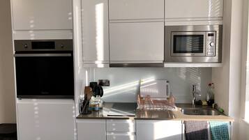 Apartment | Private kitchen | Fridge, microwave, oven, stovetop