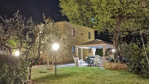 A stone building with a covered outdoor seating area. - Gorgeous home in Monte San Savino with WiFi (Monte San Savino)