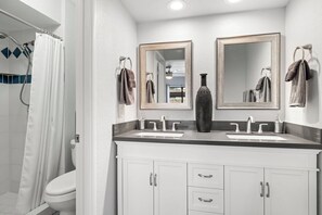Combined shower/tub, hair dryer, towels, soap