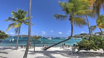 On the beach, sun-loungers, beach towels