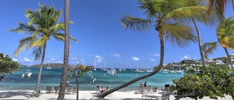 On the beach, sun-loungers, beach towels