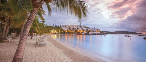 On the beach, sun loungers, beach towels