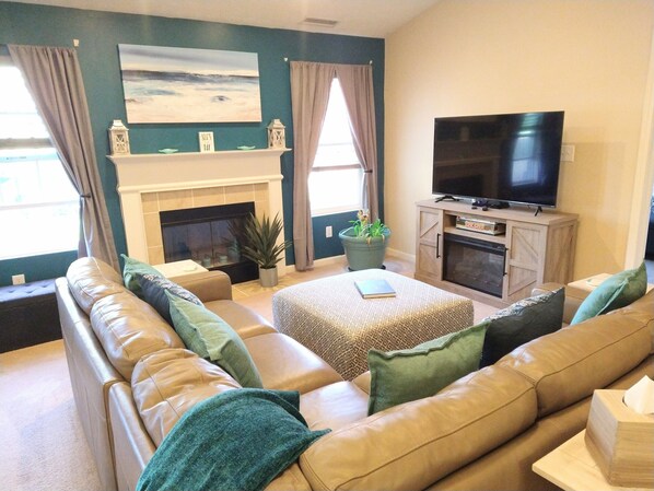 Smart TV, fireplace, DVD player, books