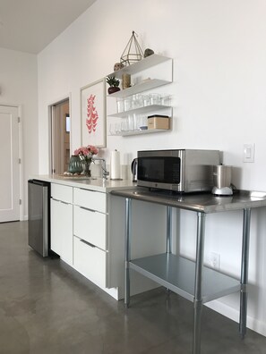 Fridge, microwave, stovetop, coffee/tea maker