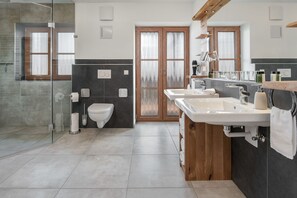 Bathtub, hair dryer, towels