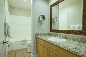 Combined shower/bathtub, hair dryer, towels, soap