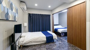 A hotel room with two beds, a dark curtain, a wooden wardrobe, a marble floor, and a wall-mounted air conditioner. - HOTEL Ciel Hills (Tokyo)