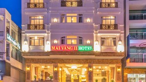 A hotel with a prominent sign reading "MAI VANG II HOTEL" and a well-lit entrance. - HANZ Premium Mai Vang 2 Hotel Dalat (Xuan Huong - Da Lat)