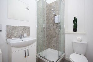 Departamento superior, baño privado (Sunnyside at City Haven) | Baño