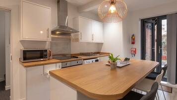 Apartment, Private Bathroom (The Courtyard City Haven ) | Shared kitchen