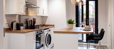 Apartment, Private Bathroom (The Courtyard City Haven ) | Shared kitchen