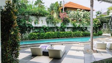 Outdoor pool, sun loungers