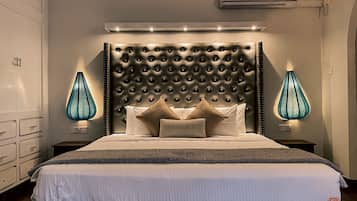 Deluxe Suite, Balcony | 1 bedroom, individually decorated, free WiFi