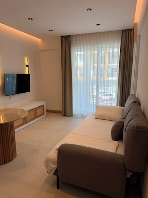 Apartamento familiar, 2 habitaciones, no fumadores | 2 dormitorios, minibar, caja fuerte y cortinas opacas