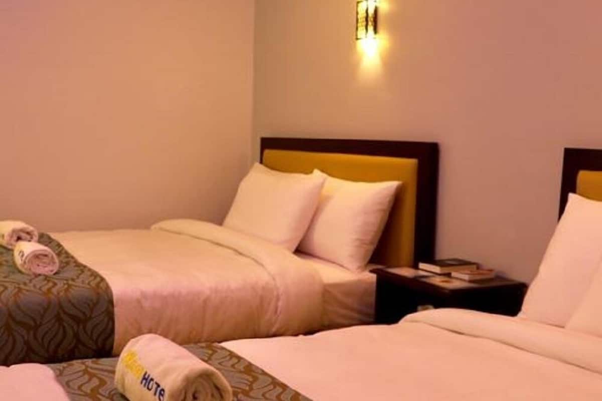 Habitación Deluxe con 2 camas individuales, 2 camas individuales | Escritorio, sistema de insonorización, wifi gratis