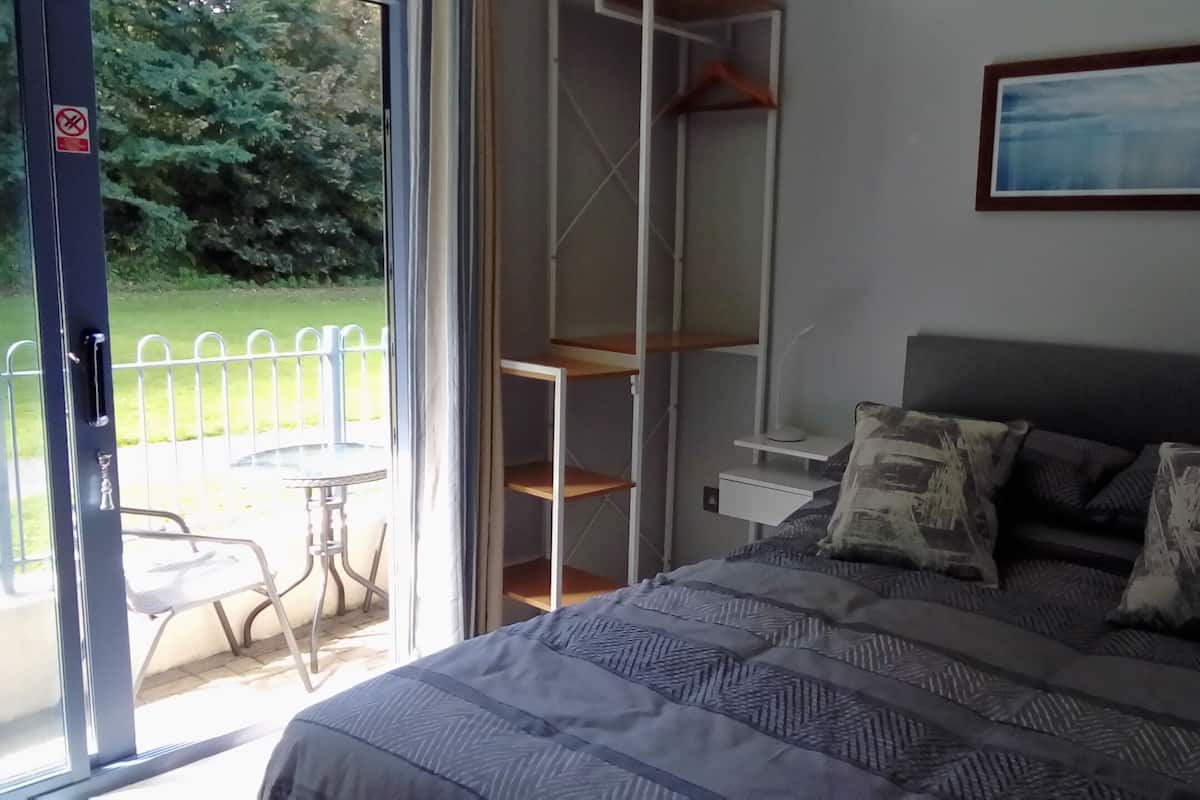 Economy Double Room, 1 Bedroom, Private Bathroom, River View | Iron/ironing board, free WiFi, bed sheets