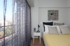 1 dormitorio, tabla de planchar con plancha, wifi gratis y ropa de cama