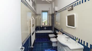 Family Apartment, 2 Bedrooms, Sea View | Bathroom | Combined shower/tub, hair dryer, bidet, towels