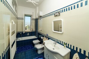 Family Apartment, 2 Bedrooms, Sea View | Bathroom | Combined shower/tub, hair dryer, bidet, towels - Camy House (Sorrento)