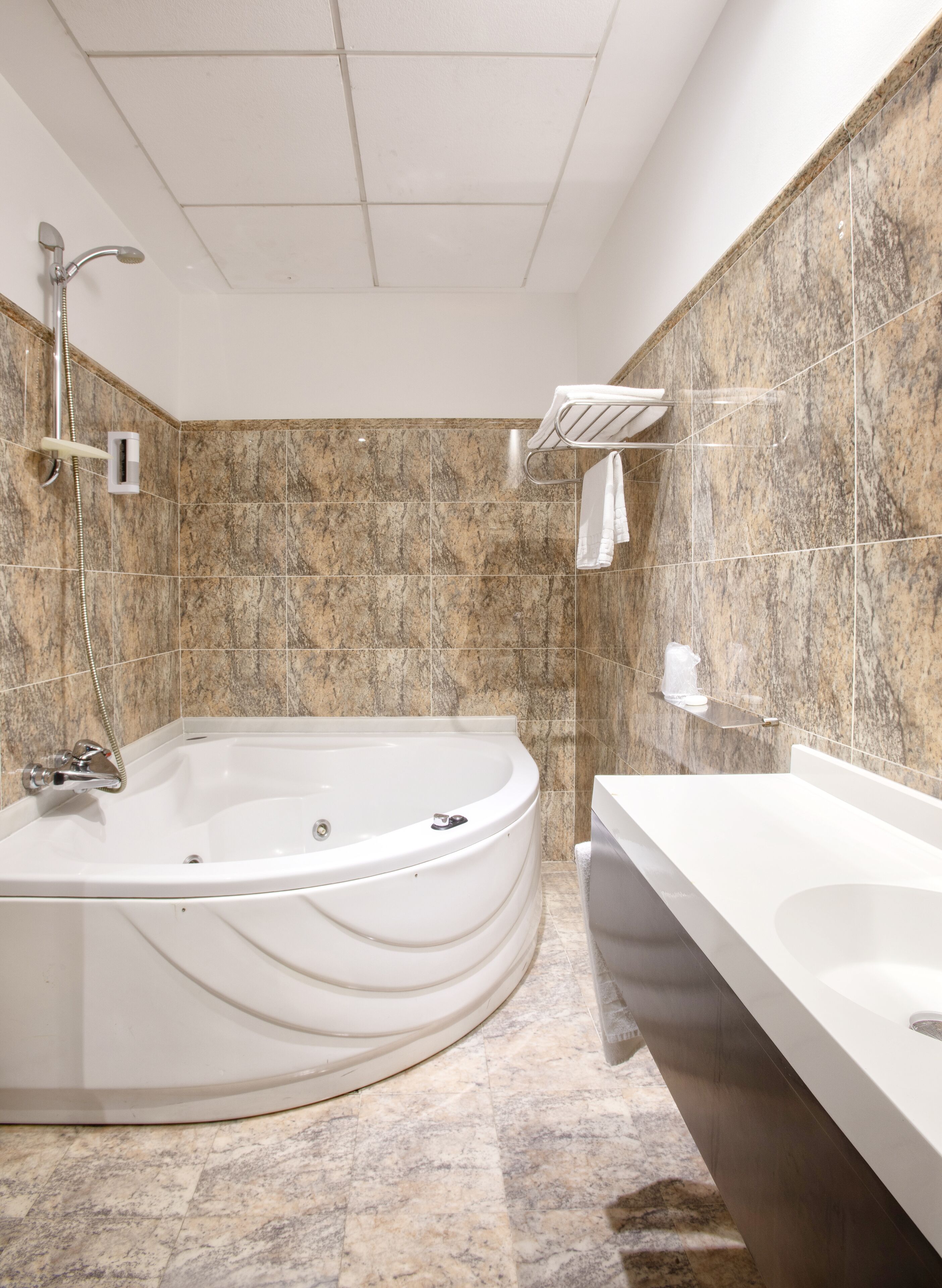 deluxe double room | bathroom | designer toiletries, hair dryer, bidet, towels