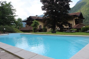 Seasonal outdoor pool, open 9:00 AM to 6:00 PM, sun loungers