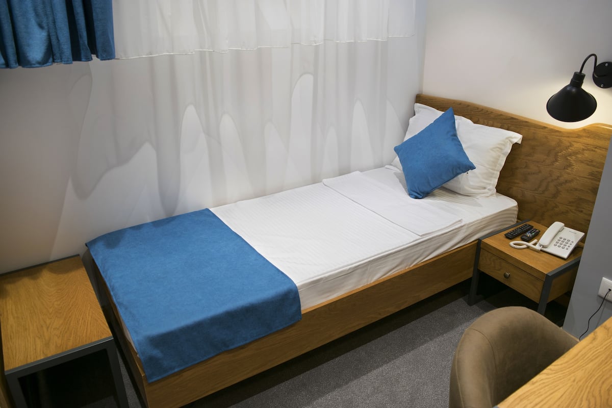 Economy Single Room | Premium bedding, minibar, in-room safe, desk