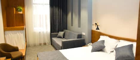 Ropa de cama de alta calidad y minibar